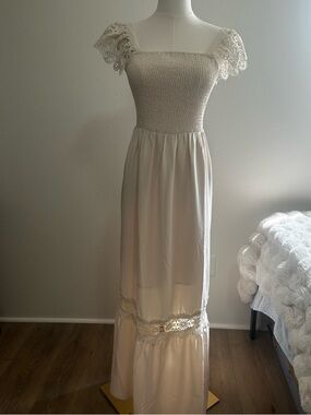 Elegant Cream Maxi Dress with Lace Details